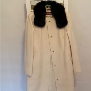 100% virgin wool with black removable fur